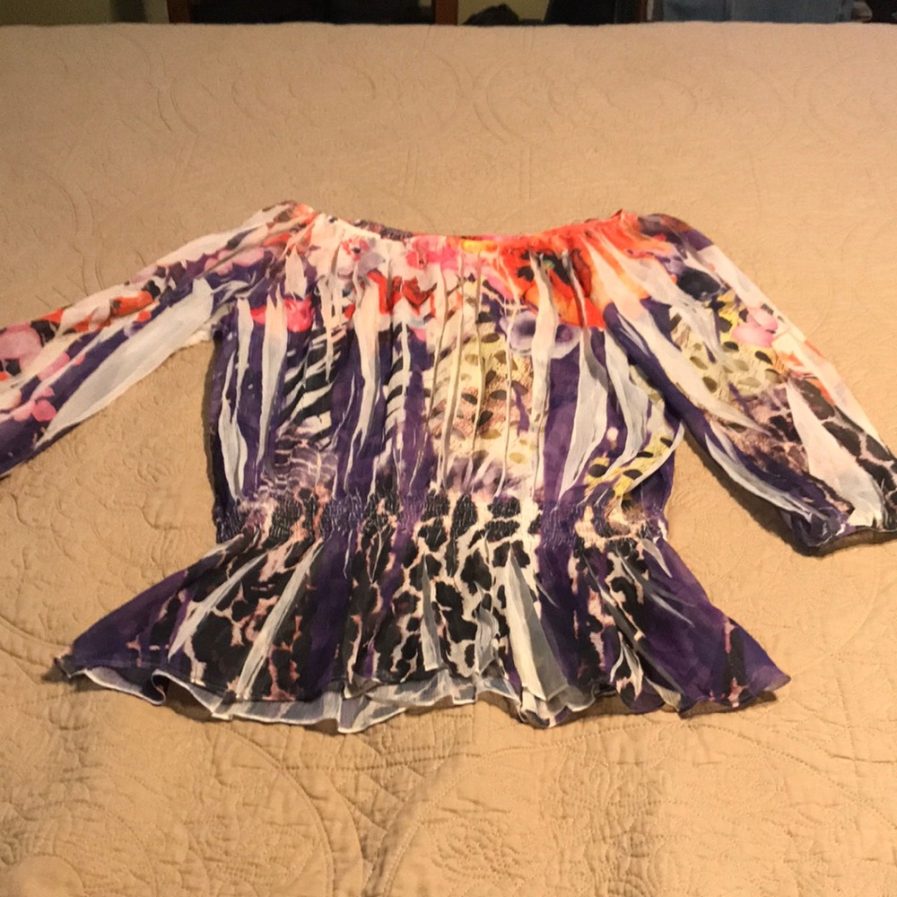 Vertical pleats . White with purple orange , yellow , green . Beautiful